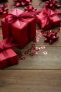 Red gift box with bows, on wooden background. Copy space. Valentine's day, birthday, Christmas Royalty Free Stock Photo