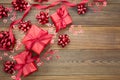 Red gift box with bows, on wooden background. Copy space. Valentine's day, birthday, Christmas Royalty Free Stock Photo