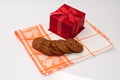 Red gift box and chocolate cookies Royalty Free Stock Photo