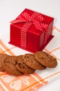 Red gift box and chocolate cookies Royalty Free Stock Photo