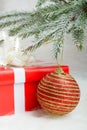 Red gift box and Christmas decoration ball Royalty Free Stock Photo