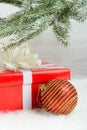 Red gift box and Christmas decoration ball Royalty Free Stock Photo