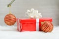 Red gift box and Christmas decoration ball Royalty Free Stock Photo