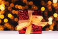 Red gift box with christmas lights Royalty Free Stock Photo
