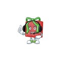 Red gift box cute cartoon character design with headphone Royalty Free Stock Photo