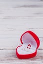 Red gift box with diamond ring. Royalty Free Stock Photo