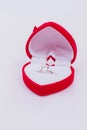 Red gift box with engagement ring. Royalty Free Stock Photo