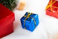 Red gift box with gold ribbon and bow with gift and christmas Decoration New year christmas background Royalty Free Stock Photo