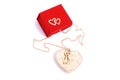 Red gift box and a heart shape jewel