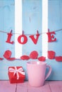 Red gift and the word love Royalty Free Stock Photo