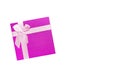 Red gift box with pink ribbon isolated on white background. Clipping path included. Royalty Free Stock Photo