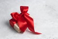 Red gift box with red satin ribbon Royalty Free Stock Photo