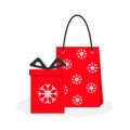 Red gift box with ribbon bow, paper shopping bag. Snowflake Royalty Free Stock Photo