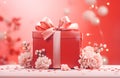 Red gift box tied with silk ribbon with bow flowers on pink background. Holiday presents shopping celebration concept Royalty Free Stock Photo