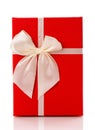 Red gift box with white ribbon bow isolated on white background. Top view Royalty Free Stock Photo