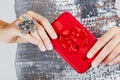 Red gift box in woman's hands. Royalty Free Stock Photo