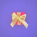 Red gift box with yellow ribbon on indigo background.square Royalty Free Stock Photo