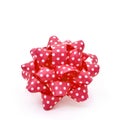 Red gift puff bow patterned with white dots Royalty Free Stock Photo