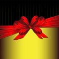 Red gift ribbon bow on gold and black background Royalty Free Stock Photo