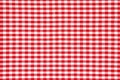 Red gingham fabric pattern background. Royalty Free Stock Photo