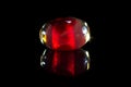 Red glass bead with reflection Royalty Free Stock Photo