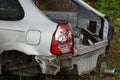 Red glass broken rear light on a gray car Royalty Free Stock Photo