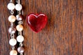 Red Glass Heart on Merbau timber with pearls