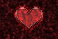Red glass heart. Valentine`s day. Glossy heart shape on a shiny background.