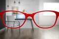 red glasses with home office sharp and blurred Royalty Free Stock Photo