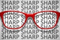 red glasses with text sharp and blurred Royalty Free Stock Photo