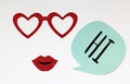 Red glitter glasses and lips with green speech bubble saying hi Royalty Free Stock Photo