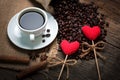 Red glitter hearts on coffee beans Royalty Free Stock Photo