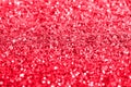 Red glitter texture festive abstract background, workpiece for design, soft focus