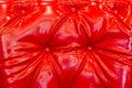 Red glossy shiny polished leatherette leather