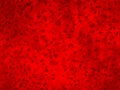 Red glowing background with grains