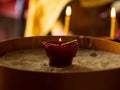 Red glowing candles in a church. Christening Orthodox ceremony background