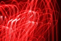 Red glowing light lines abstract backdrop design