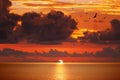 Red glowing sunset above serene sea Royalty Free Stock Photo