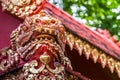 Red gold Asia monster statue in north of Thai temple