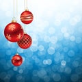 Red and gold Christmas Balls on Blue flare Background Royalty Free Stock Photo