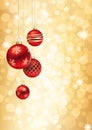 Red and gold Christmas Balls on Golden flare Background Royalty Free Stock Photo