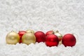 Red and gold Christmas balls ornaments on white background Royalty Free Stock Photo