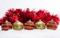 Red and gold Christmas balls in snow with tinsel and snowflakes, christmas background Royalty Free Stock Photo