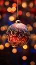 Red and Gold Christmas Ornament Hanging from a Chain Royalty Free Stock Photo