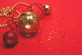 Red and gold christmas ornaments on red background. Royalty Free Stock Photo
