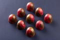 Red and gold colored bonbons on black background Royalty Free Stock Photo