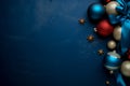 Red, Gold and Dark blue Christmas decoration balls with satin ribbons on dark background. Merry christmas and happy new year Royalty Free Stock Photo