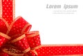 Red and gold gift bow and ribbon Royalty Free Stock Photo