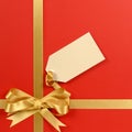 Red and gold gift with tag Royalty Free Stock Photo