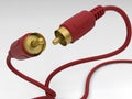 Red gold-plated audio cable illustration Royalty Free Stock Photo